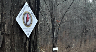 Audubon Sign on Tree
